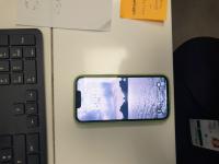 CS1284/2025 IPHONE WITH GREEN COVER